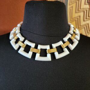 Trifari Crown Choker Vintage 1955-69 White plastic with gold tone links.